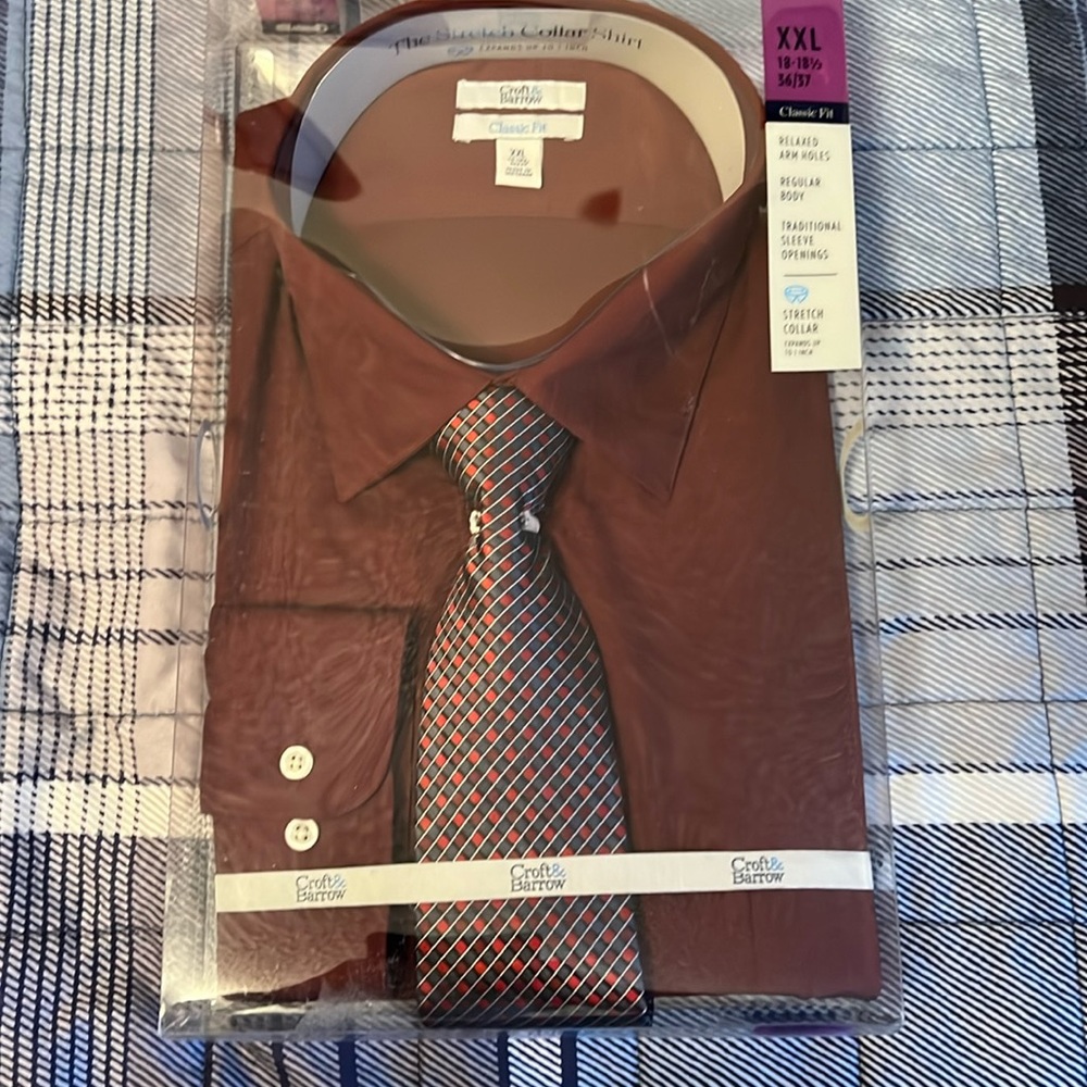 New. Never opened men’s button up with tie